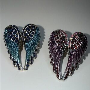 Two beautiful Winged angel stretch ring Blue and Purple Crystals you get both